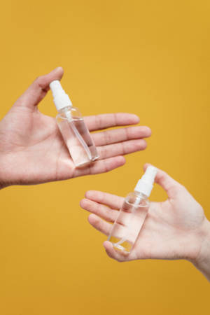 Couple Hands Alcohol Sprays Wallpaper