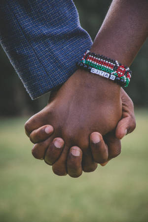 Couple Hands Beaded Bracelets Wallpaper