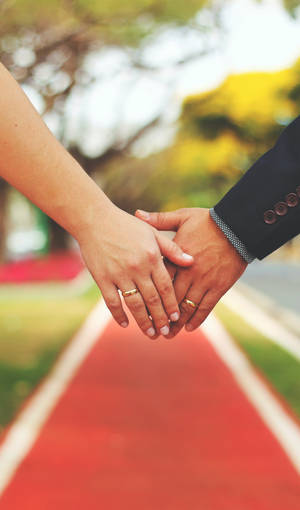 Couple Hands Wedding Aisle Wallpaper