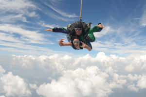 Couple Tandem Skydiving Wallpaper