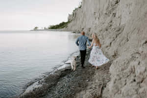 Coupleand Dog Walking Near Scarborough Bluffs Wallpaper