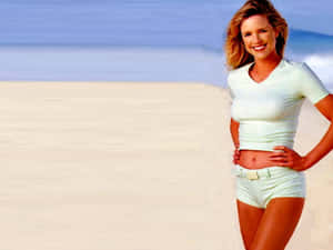 Courtney Thorne-smith Smiling Radiantly Wallpaper