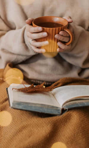 Cozy Autumn Readingwith Coffee Wallpaper