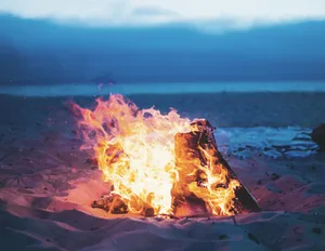Cozy Beach Campfire Wallpaper