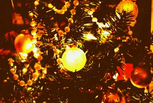 Cozy Boho Christmas Corner With Chic Decorations Wallpaper