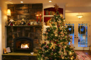 Cozy Christmas Fireplacewith Tree Wallpaper