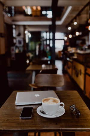 Cozy Coffee Shop Workstation Wallpaper