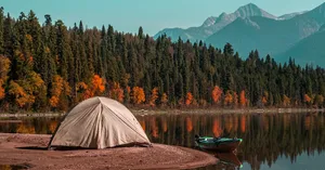 Cozy Fall Camping At Scenic Lakeside Campsite Wallpaper