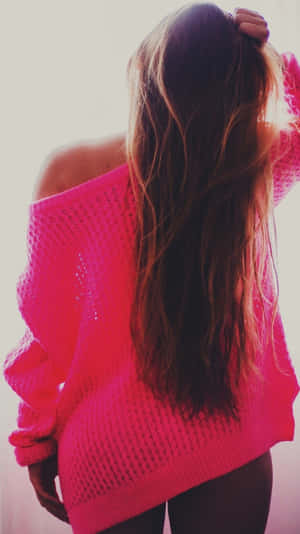 Cozy Pink Sweater On White Hanger Wallpaper
