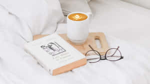 Cozy_ Reading_ Time_with_ Coffee Wallpaper