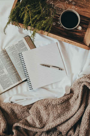 Cozy Readingand Writing Setup Wallpaper