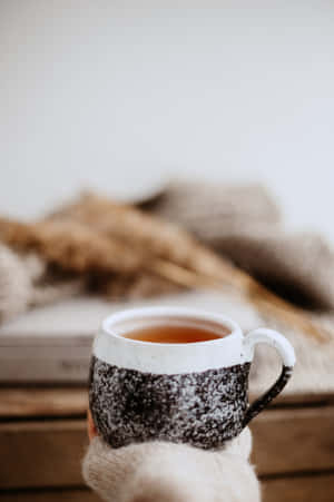 Cozy Tea Time Minimalist Setting.jpg Wallpaper