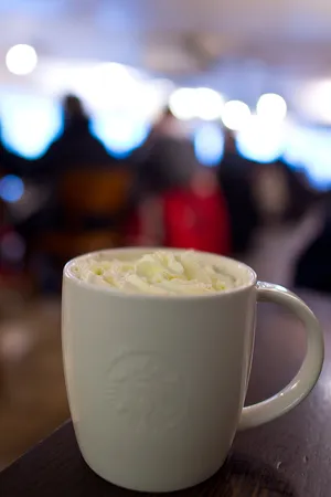 Cozy Winter Drinks By The Window Wallpaper