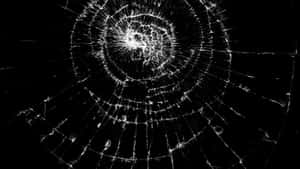 Cracked Screen Effect Black Background.jpg Wallpaper