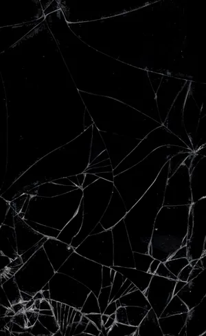 Cracked Screen Texture Black Background.jpg Wallpaper