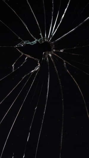 Cracked Screen Texture Dark Background.jpg Wallpaper