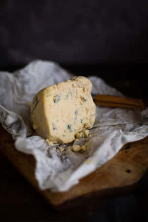 Creamy Gold Texture Of Blue Cheese Wallpaper