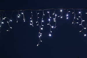 Create A Twinkling Ambiance With Magical Fairy Lights Wallpaper