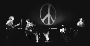 Creedence Clearwater Revival Peace Concert Performance Wallpaper