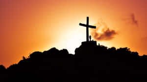 Cross With Ray Of Light Shining From Heaven Wallpaper