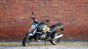 Cruise In Style On A Black Bmw R1200r Motorbike Wallpaper