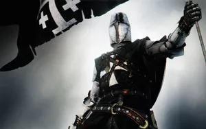 Crusader Knight Holding A Flag Wallpaper