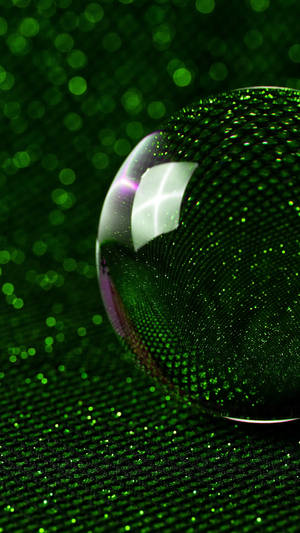 Crystal Ball With Green Glitter Wallpaper