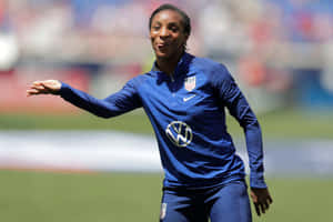 Crystal Dunn In Action On The Soccer Field Wallpaper