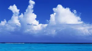 Cumulous Clouds Above Horizon Wallpaper