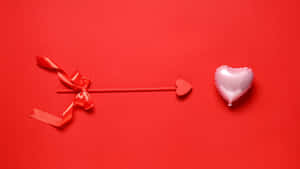 Cupid Arrow And Heart Balloon Wallpaper