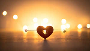 Cupid Arrow With Heart Wallpaper