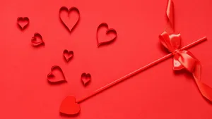 Cupid Arrow With Hearts Wallpaper