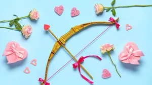 Cupid Arrow With Hearts Wallpaper