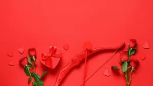 Cupid Arrow With Roses Wallpaper