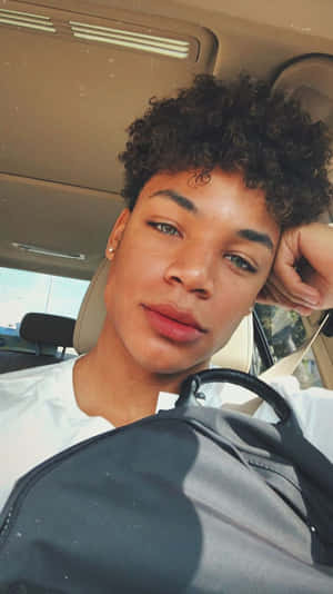 Curly_ Hair_ Boy_with_ Backpack_in_ Car.jpg Wallpaper