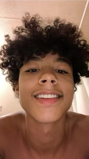 Curly Haired Boy Selfie Wallpaper