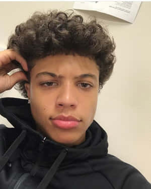 Curly Haired Boy Selfie Wallpaper