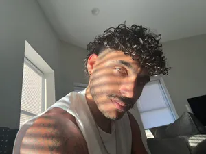 Curly Haired Manin Sunlight Wallpaper