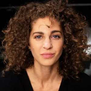 Curly Haired Woman Portrait Wallpaper