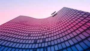 Curved Glass Facade Sunset Wallpaper