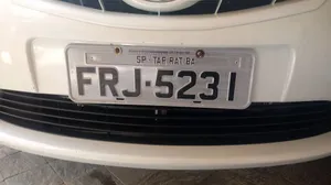 Custom Car License Plate On A Stylish Vehicle Wallpaper