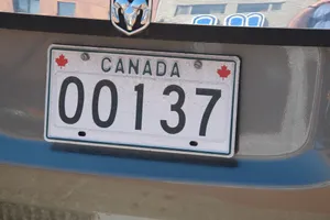 Custom Car License Plate On A Stylish Vehicle Wallpaper