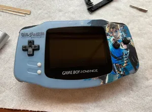 Custom Game Boy Advancewith Graphic Decal Wallpaper