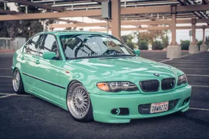 Custom Green B M W E46 Sedan Parked Wallpaper