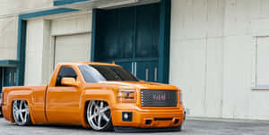 Custom Orange G M C Truck Trokiando Wallpaper