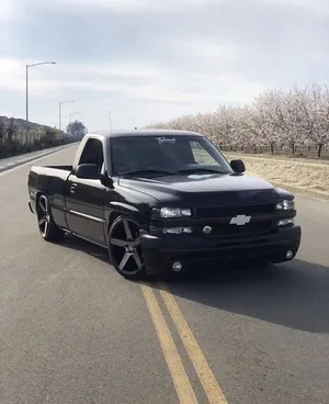 Customized Black Truck On Road Wallpaper