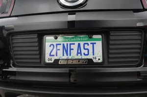 Customized Car License Plate On A Stylish Vehicle Wallpaper