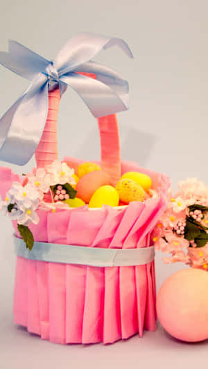 Customized Easter Basket With Colorful Chocolate Eggs Wallpaper