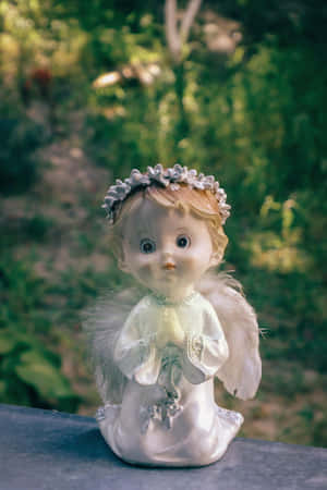 Cute Angel Cherub Figurine Wallpaper
