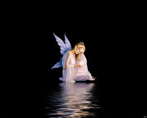 Cute Angel Resting In The Dark Wallpaper